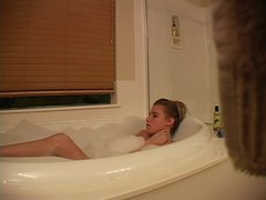 Cumshotti presents: Hidden camera captures girl masturbating in bathtub