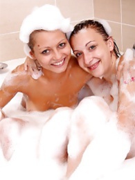 Cumshotti presents: Naughty sexy young chicks taking a hot bubble bath together