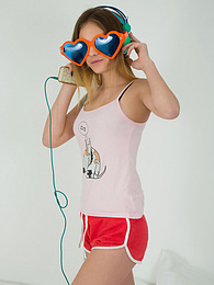 Cumshotti presents: This doll really knows how to have fun with her and how she can show off her pussy and listen to some beats at the same time.